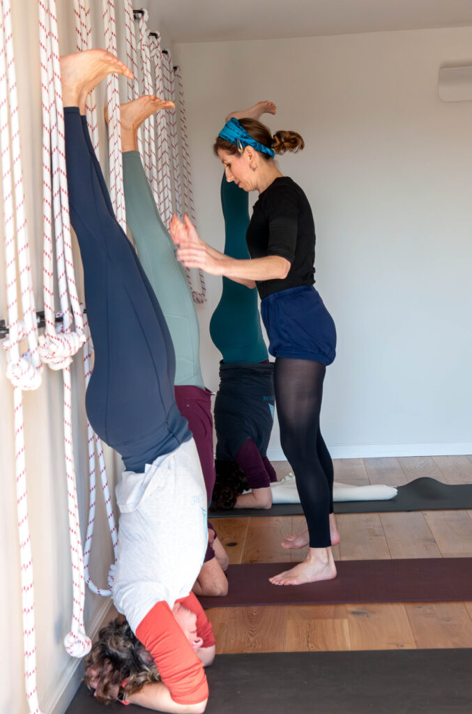 Assisting in Headstand